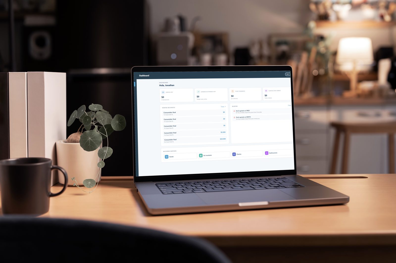 Panel de Logify abierto en laptop, mostrando el dashboard con ventas y alertas de stock